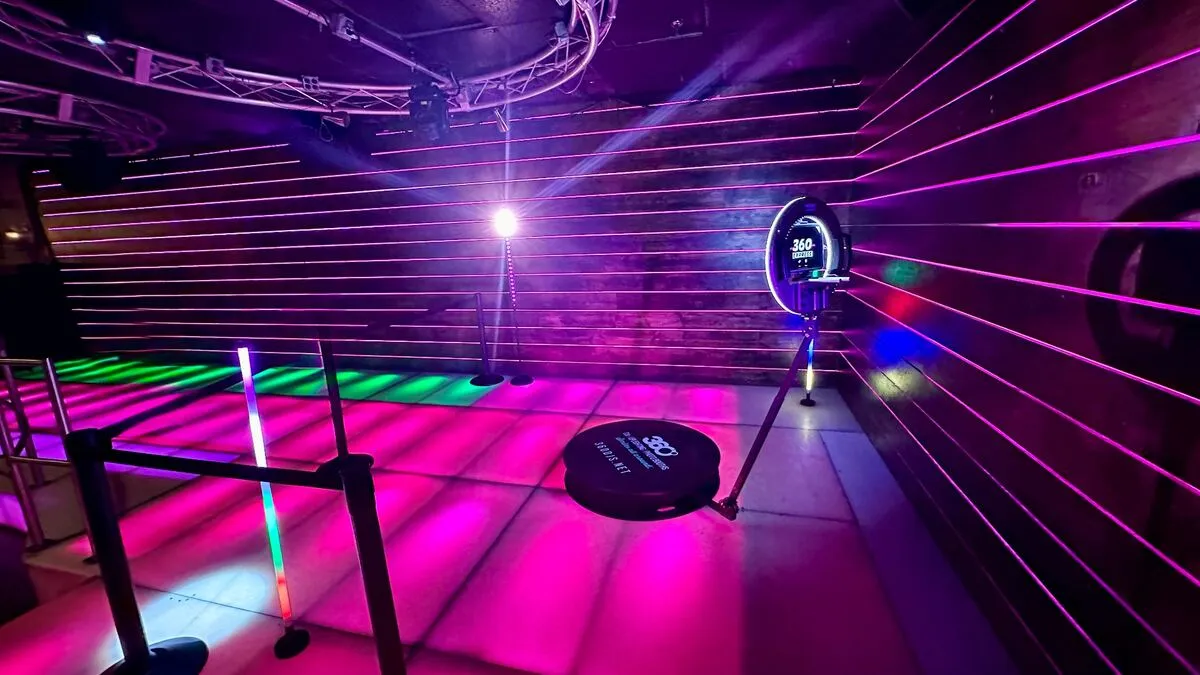 360 express video booth capturing slow-motion video at a sweet 16 celebration
