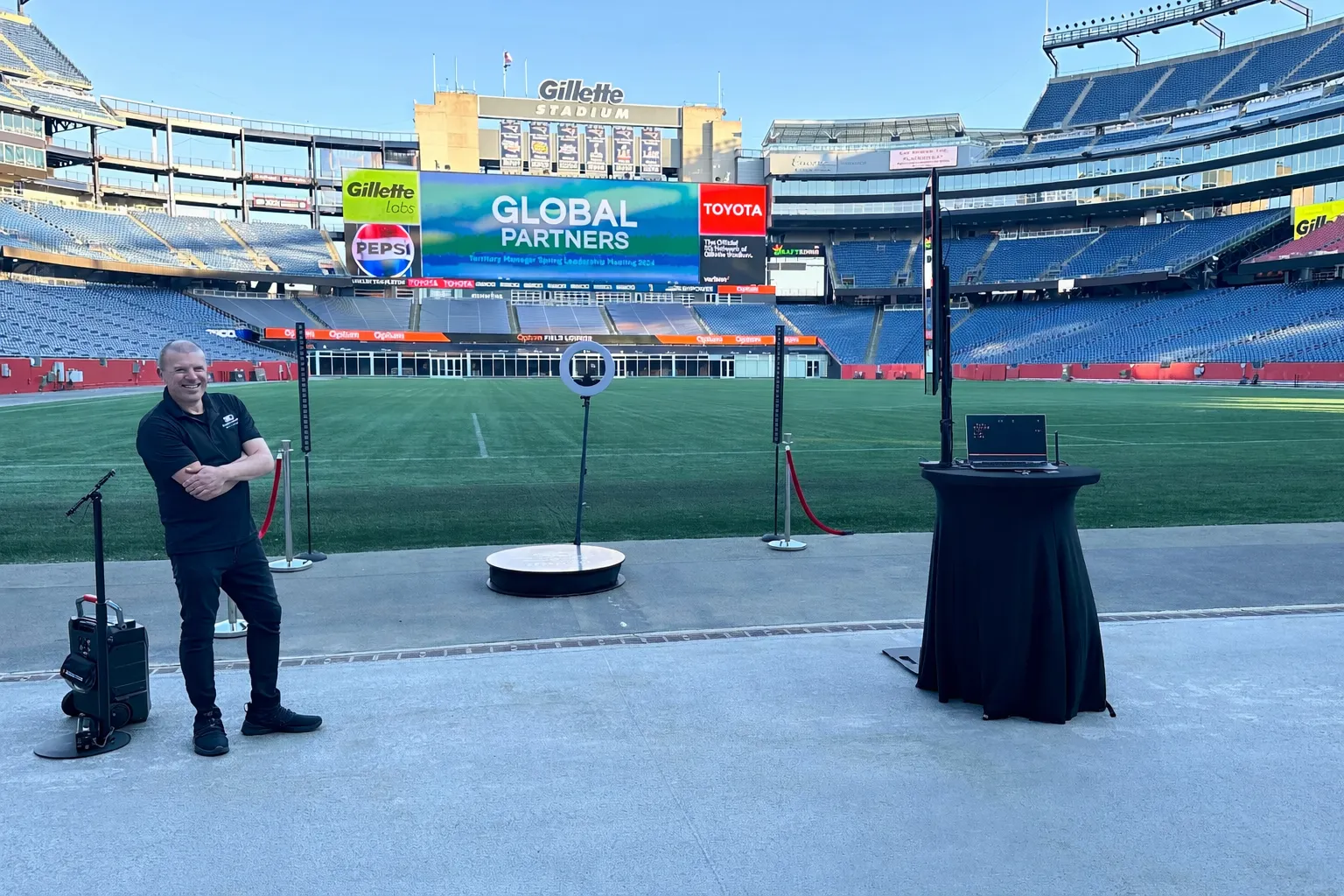 360 photo booth setup showing platform and camera arm clearance