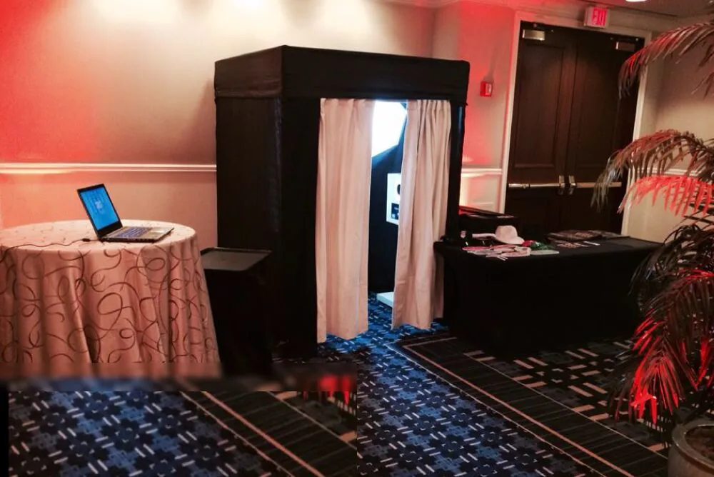 5x5 Classic Enclosed Booth with black enclosure and curtain entrance at an event venue