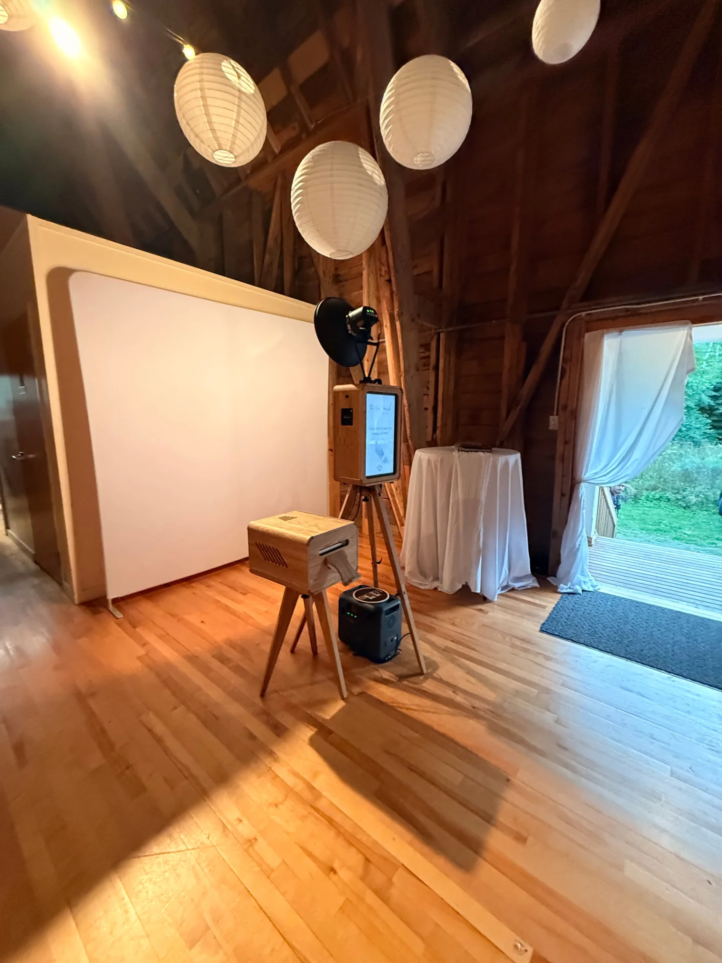 The Lux Booth installed with a white backdrop at an elegant venue