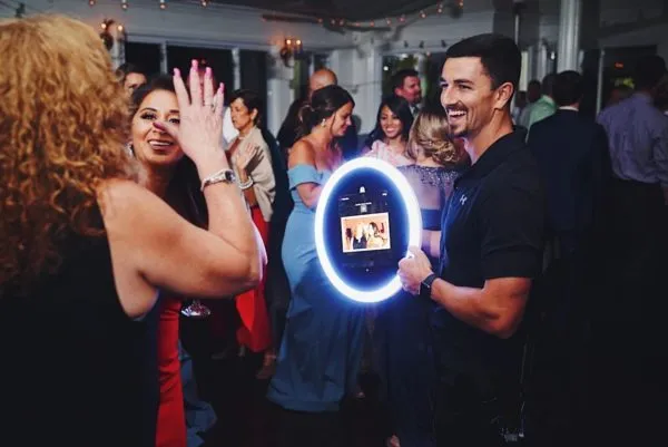 Roaming photo booth capturing candid moments at a party